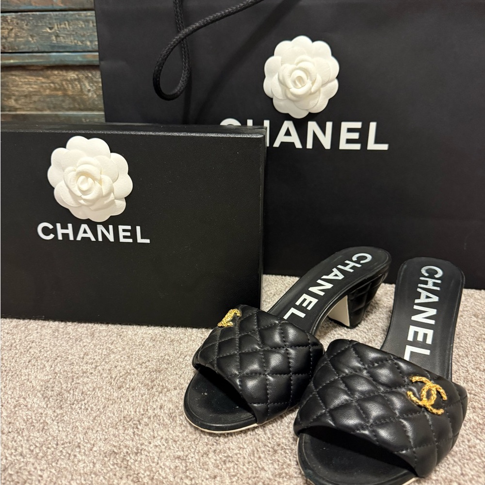 Chanel Black Quilted Mules with Gold Logo -includes bag, box and dust bags.